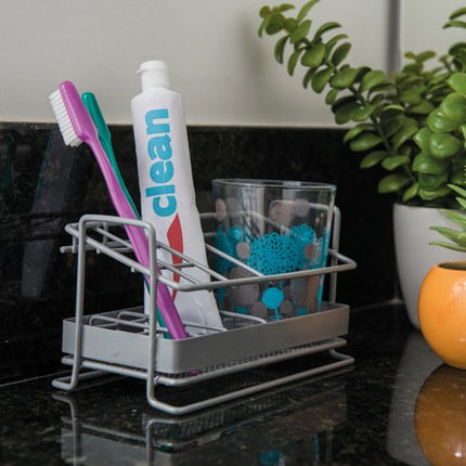 Porta cepillos y crema dental